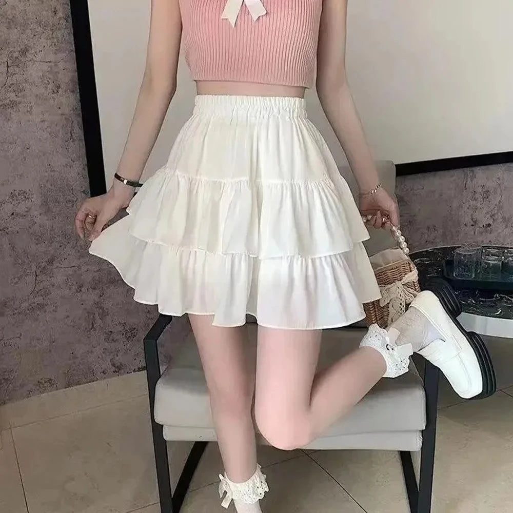 The Wren Skirt — Pleated A-Line Mini in White
