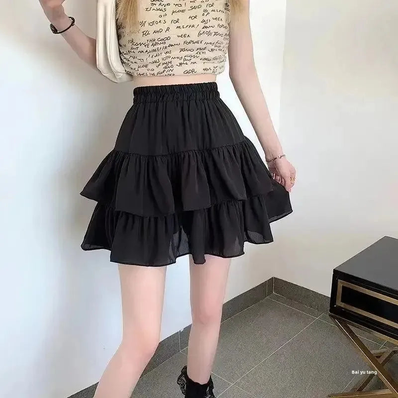 The Wren Skirt — Pleated A-Line Mini in White