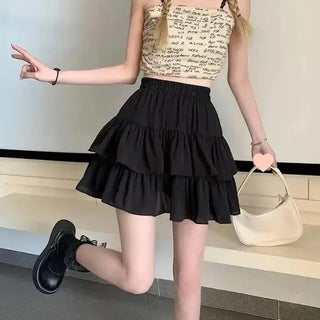 The Wren Skirt — Pleated A-Line Mini in White