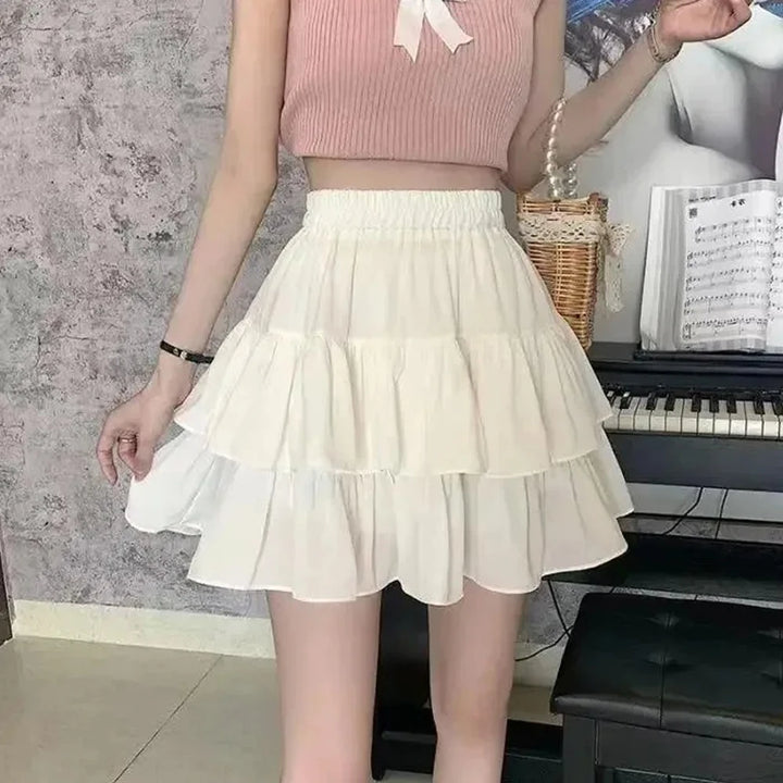 The Wren Skirt — Pleated A-Line Mini in White