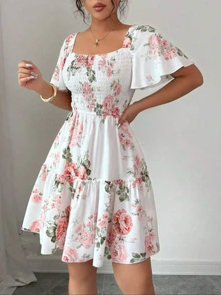The Marielle Dress — Floral Silhouette Mini in White